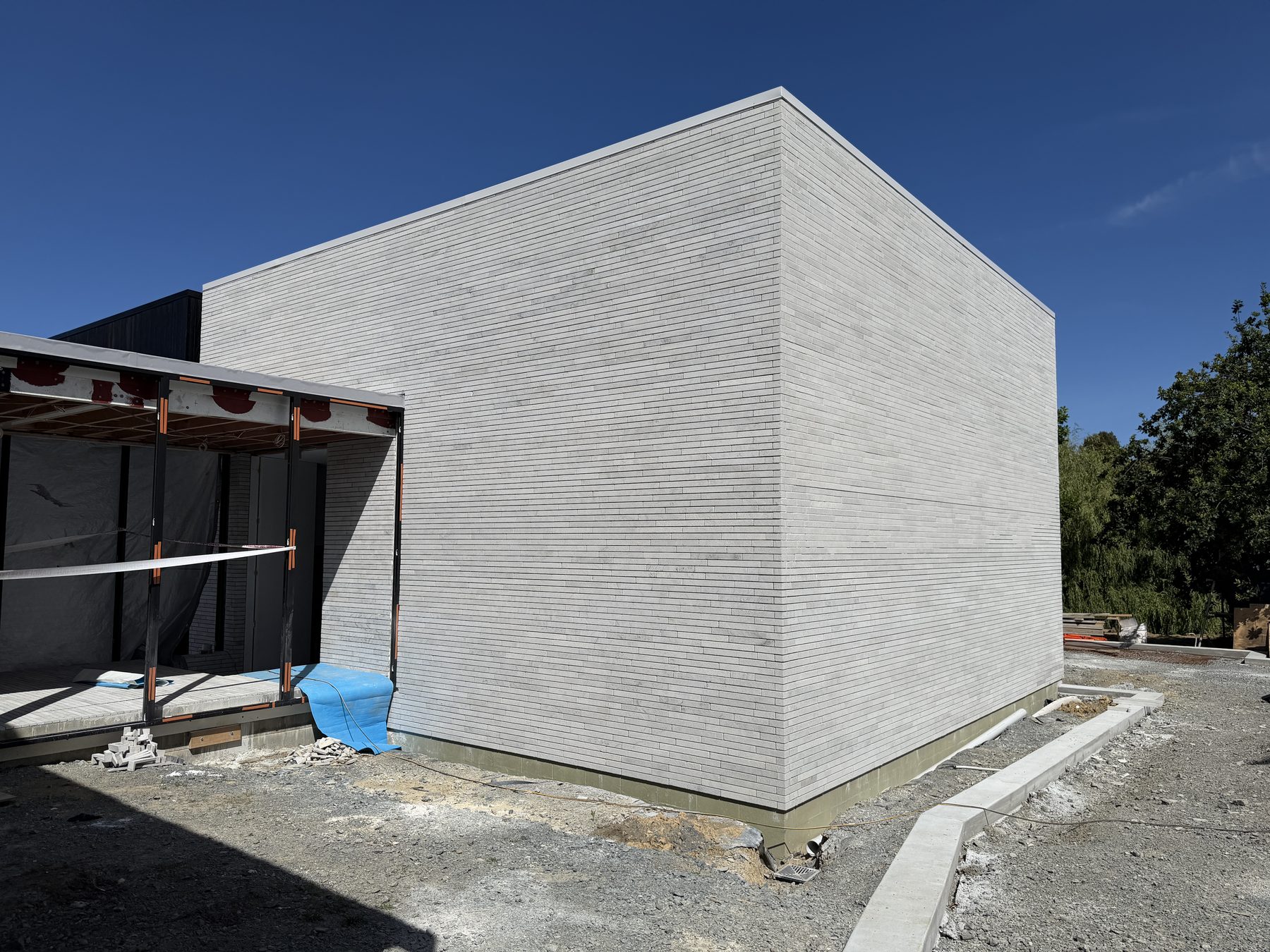 Linear-format stone cladding on a contemporary facade